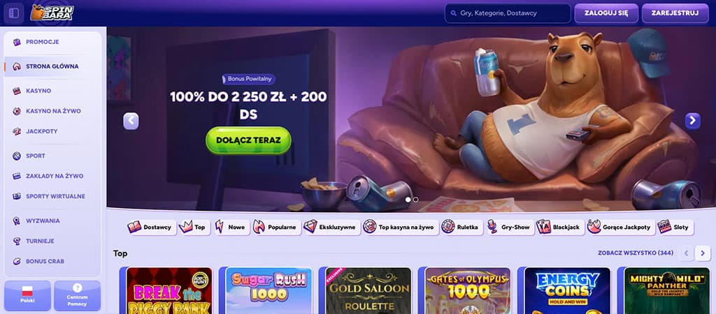 Spinbara Casino, strona główna, bonus powitalny, zwierzę na kanapie, napój, TV, gry kasynowe, dołącz teraz, menu po lewej